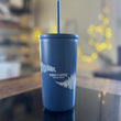 Load image into Gallery viewer, A blue mug with straw and fern and flower design