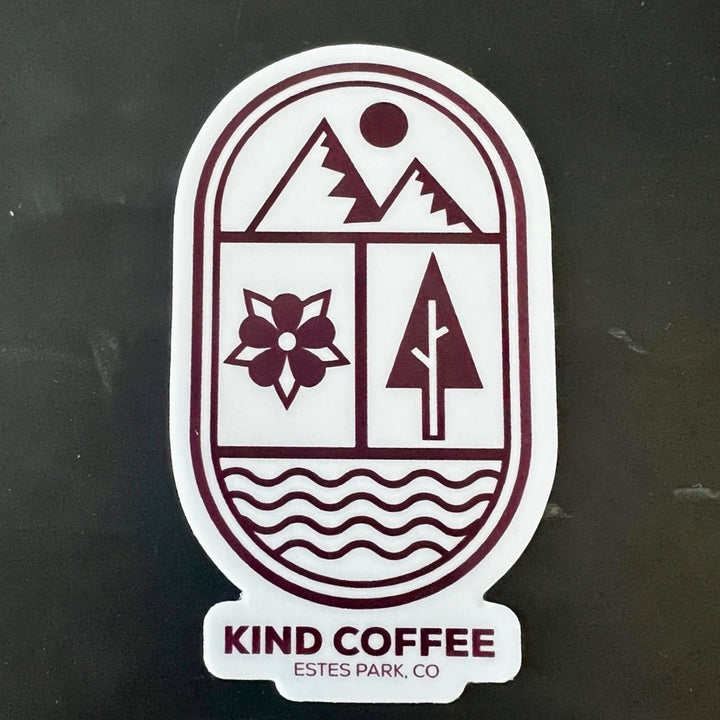 A sticker with the modern logo; mountain, flower, tree, river in an oval shape