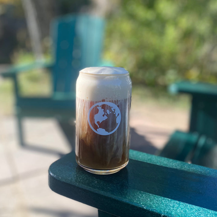 glass soda can with cold brew and cold foam 