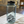 Load image into Gallery viewer, A single Nalgene, in a clear seafoam color with mountain design along bottom. 
