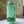 Load image into Gallery viewer, A single Nalgene, in a green glow in the dark color with mountain design along bottom. 
