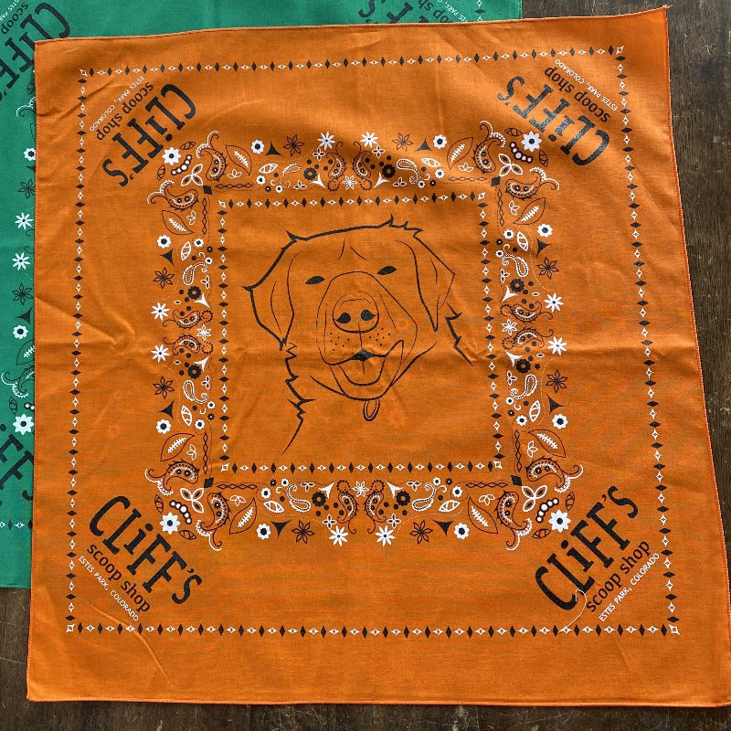 Orange bandana, "Cliff's Scoop Shop", Clifford the dog's face in the center