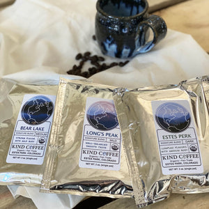 Three varieties of 3 ounce coffee packs in Bear Lake (medium), Longs Peak (mild), and Estes Perk (dark)