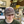 Load image into Gallery viewer, Barista wearing a Kind Coffee Mountain Trucker Hat
