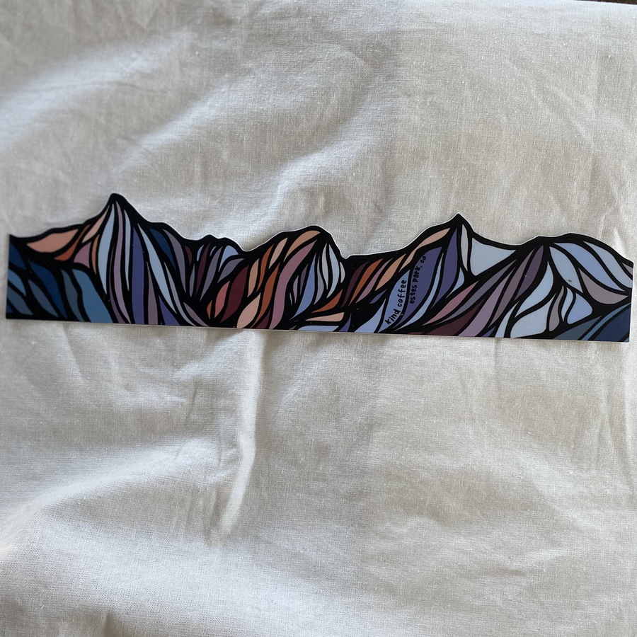 Long sticker of colorful abstract mountains.